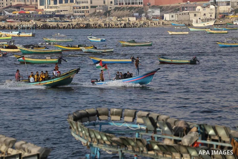 Palestinians celebrate on the second day of Eid al-Fitr holiday which marks the end of the Muslim holy month of Ramadan at the seaport of Gaza city June 26, 2017. Photo by Mohammed Asad
