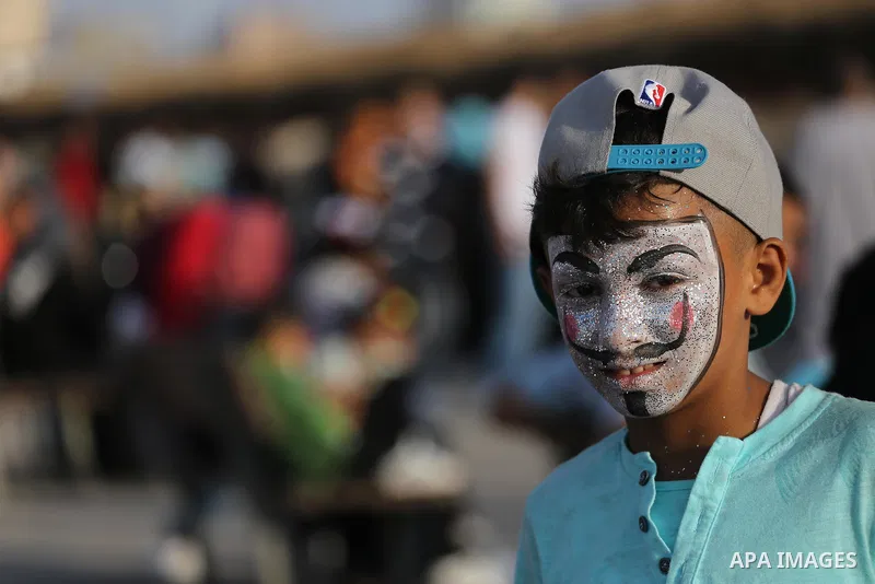 Palestinians celebrate on the second day of Eid al-Fitr holiday which marks the end of the Muslim holy month of Ramadan at the seaport of Gaza city June 26, 2017. Photo by Mohammed Asad