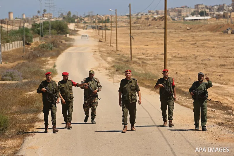 Members of Palestinian security forces patrol a section of the border with Egypt, in the southern Gaza strip town of Rafah, on June 29, 2017. The buffer zone is expected to extend for a length of 12 kilometres and at a w...