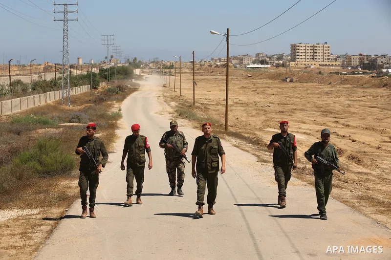 Members of Palestinian security forces patrol a section of the border with Egypt, in the southern Gaza strip town of Rafah, on June 29, 2017. The buffer zone is expected to extend for a length of 12 kilometres and at a w...