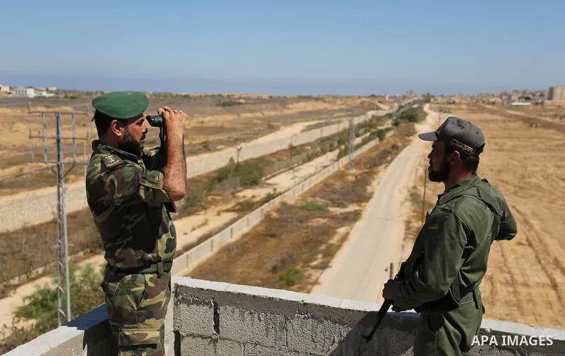 Members of Palestinian security forces patrol a section of the border with Egypt, in the southern Gaza strip town of Rafah, on June 29, 2017. The buffer zone is expected to extend for a length of 12 kilometres and at a w...