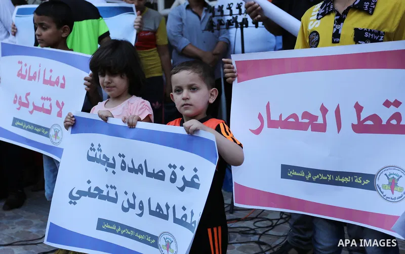 Palestinians take part in a protest against Israeli blockade and demanding to travel for treatment, in Gaza city on June 29, 2017. Hamas accused the Palestinian Authority and Israel of refusing to grant documents to Gaza...