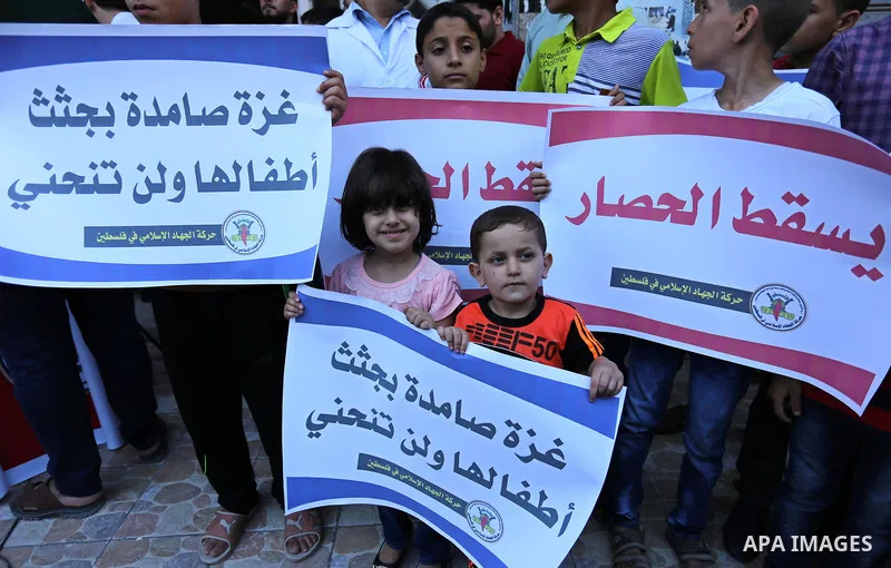 Palestinians take part in a protest against Israeli blockade and demanding to travel for treatment, in Gaza city on June 29, 2017. Hamas accused the Palestinian Authority and Israel of refusing to grant documents to Gaza...