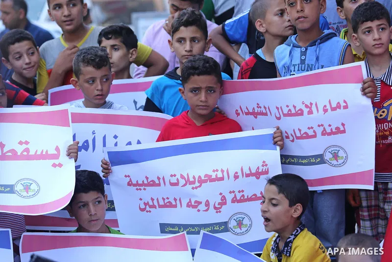 Palestinians take part in a protest against Israeli blockade and demanding to travel for treatment, in Gaza city on June 29, 2017. Hamas accused the Palestinian Authority and Israel of refusing to grant documents to Gaza...