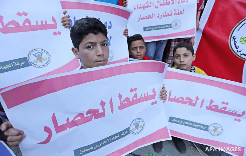 Palestinians take part in a protest against Israeli blockade and demanding to travel for treatment, in Gaza city on June 29, 2017. Hamas accused the Palestinian Authority and Israel of refusing to grant documents to Gaza...