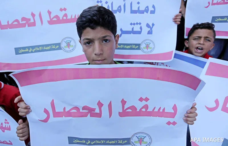 Palestinians take part in a protest against Israeli blockade and demanding to travel for treatment, in Gaza city on June 29, 2017. Hamas accused the Palestinian Authority and Israel of refusing to grant documents to Gaza...