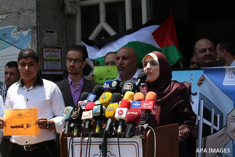 Palestinian journalists take part in a protest against the decision of Palestinian Authority's public prosecutor to block 11 Palestinian news websites in the Israeli-occupied West Bank, in Gaza city on July 01, 2017. Pho...