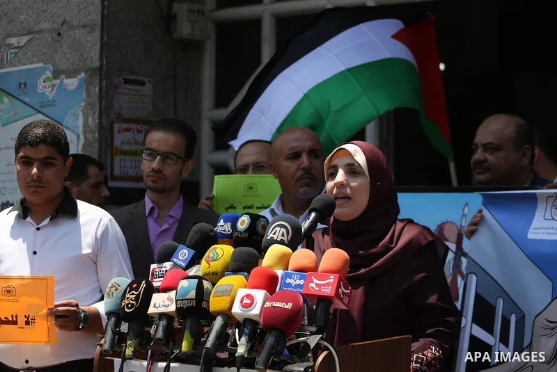 Palestinian journalists take part in a protest against the decision of Palestinian Authority's public prosecutor to block 11 Palestinian news websites in the Israeli-occupied West Bank, in Gaza city on July 01, 2017. Pho...