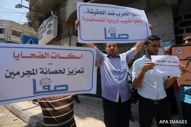 Palestinian journalists take part in a protest against the decision of Palestinian Authority's public prosecutor to block 11 Palestinian news websites in the Israeli-occupied West Bank, in Gaza city on July 01, 2017. Pho...
