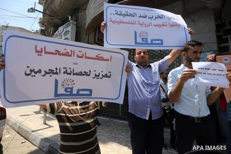 Palestinian journalists take part in a protest against the decision of Palestinian Authority's public prosecutor to block 11 Palestinian news websites in the Israeli-occupied West Bank, in Gaza city on July 01, 2017. Pho...