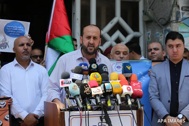 Palestinian journalists take part in a protest against the decision of Palestinian Authority's public prosecutor to block 11 Palestinian news websites in the Israeli-occupied West Bank, in Gaza city on July 01, 2017. Pho...