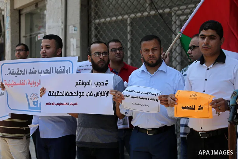 Palestinian journalists take part in a protest against the decision of Palestinian Authority's public prosecutor to block 11 Palestinian news websites in the Israeli-occupied West Bank, in Gaza city on July 01, 2017. Pho...