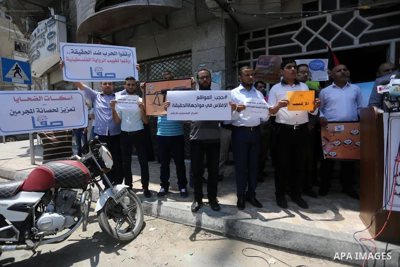 Palestinian journalists take part in a protest against the decision of Palestinian Authority's public prosecutor to block 11 Palestinian news websites in the Israeli-occupied West Bank, in Gaza city on July 01, 2017. Pho...