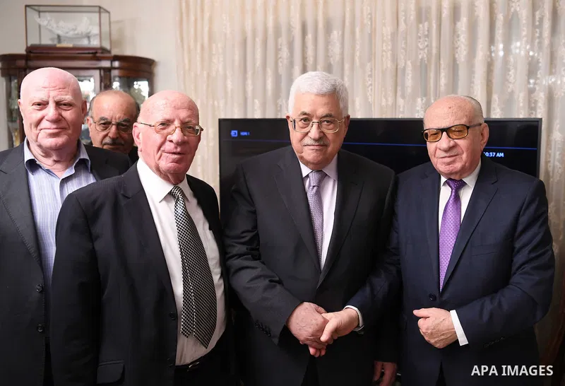 Palestinian President Mahmoud Abbas gives the Ambassador Daleel Mikhail Al-Qusous, the Medal of Merit and Excellence, in Amman on July 1, 2017. Photo by Thaer Ganaim