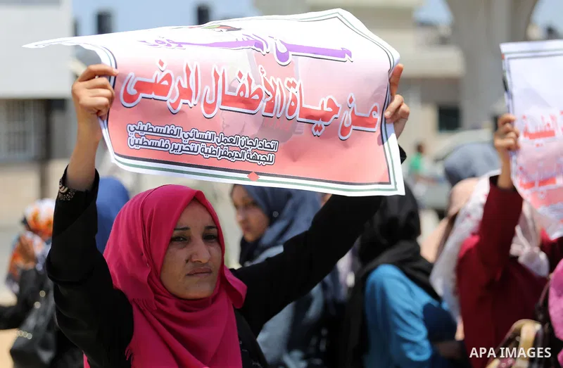 Palestinians take part in a protest demanding to travel for treatment, in Gaza city on July 3, 2017. Hamas accused the Palestinian Authority and Israel of refusing to grant documents to Gazans in need of permission to se...