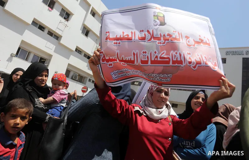 Palestinians take part in a protest demanding to travel for treatment, in Gaza city on July 3, 2017. Hamas accused the Palestinian Authority and Israel of refusing to grant documents to Gazans in need of permission to se...