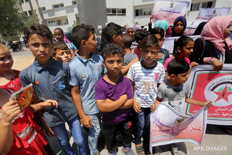 Palestinians take part in a protest demanding to travel for treatment, in Gaza city on July 3, 2017. Hamas accused the Palestinian Authority and Israel of refusing to grant documents to Gazans in need of permission to se...