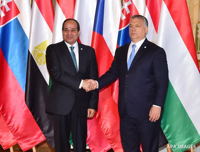 Egyptian President Abdel Fattah al-Sisi shakes hands with Hungarian Prime Minister Viktor Orban during a summit of the Visegrad group countries (V4) and Egypt in Budapest on July 4, 2017. Photo by Egyptian President Offi...