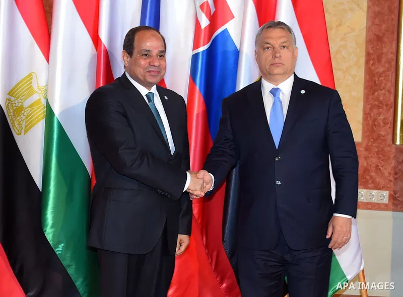 Egyptian President Abdel Fattah al-Sisi shakes hands with Hungarian Prime Minister Viktor Orban during a summit of the Visegrad group countries (V4) and Egypt in Budapest on July 4, 2017. Photo by Egyptian President Offi...