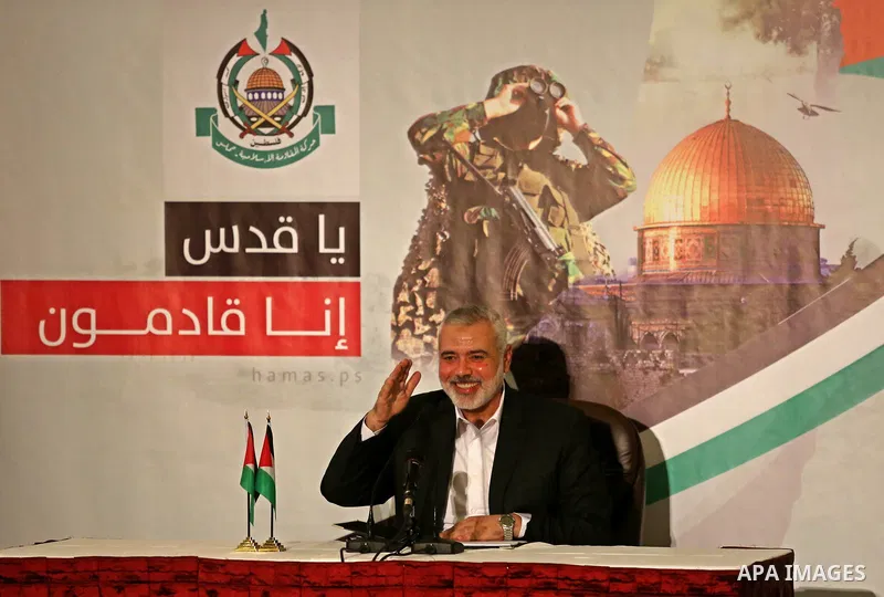 Hamas Chief Ismail Haniyeh waves before giving a speech in Gaza City on July 5, 2017. Haniya said that meetings between his movement and the Egyptian authorities would ease the siege imposed on the Gaza Strip for more th...