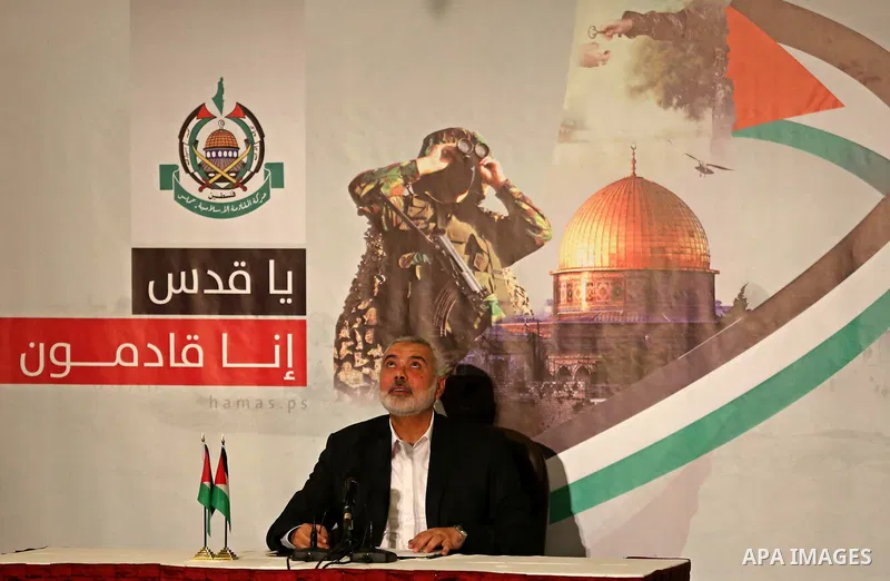 Hamas Chief Ismail Haniyeh looks up before giving a speech in Gaza City on July 5, 2017. Haniya said that meetings between his movement and the Egyptian authorities would ease the siege imposed on the Gaza Strip for more...