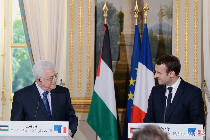 French President Emmanuel Macron and Palestinian President Mahmoud Abbas, hold a joint press conference following their meeting at the Elysee Palace in Paris, on July 5, 2017. Photo by Thaer Ganaim