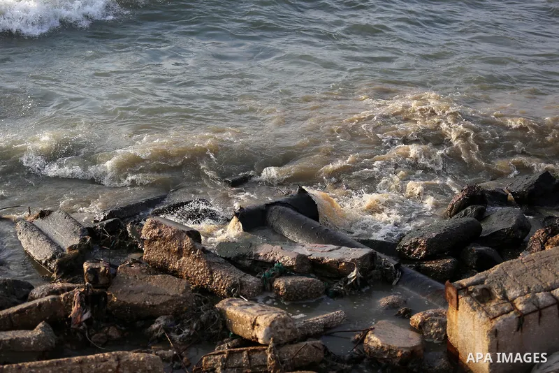 Sewage flows from an outlet into the sea in front of the coast of Gaza city, in July 5, 2017. An immediate consequence of the electricity cuts has been suffering for Gazans. A new U.N. report said Gaza gets electricity j...