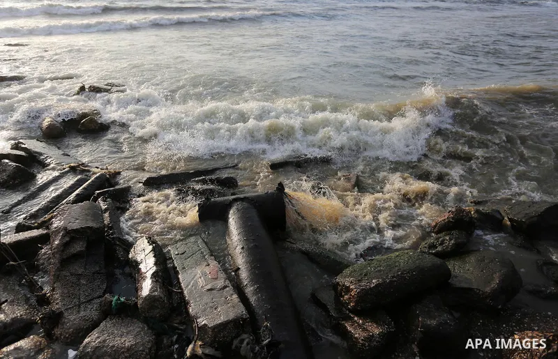 Sewage flows from an outlet into the sea in front of the coast of Gaza city, in July 5, 2017. An immediate consequence of the electricity cuts has been suffering for Gazans. A new U.N. report said Gaza gets electricity j...