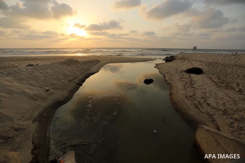 Sewage flows from an outlet into the sea in front of the coast of Gaza city, in July 5, 2017. An immediate consequence of the electricity cuts has been suffering for Gazans. A new U.N. report said Gaza gets electricity j...