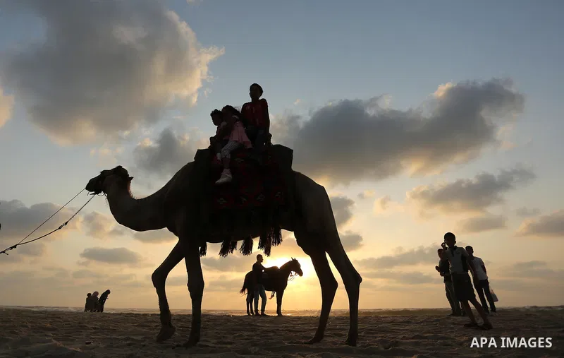 Palestinians enjoy their time of the beach of Gaza city, on July 5, 2017. An immediate consequence of the electricity cuts has been suffering for Gazans. A new U.N. report said Gaza gets electricity just four to six hour...