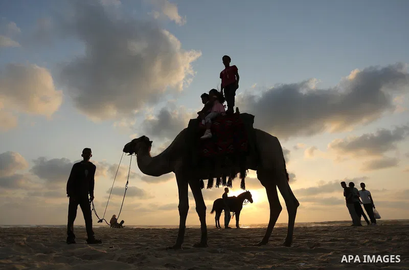 Palestinians enjoy their time of the beach of Gaza city, on July 5, 2017. An immediate consequence of the electricity cuts has been suffering for Gazans. A new U.N. report said Gaza gets electricity just four to six hour...