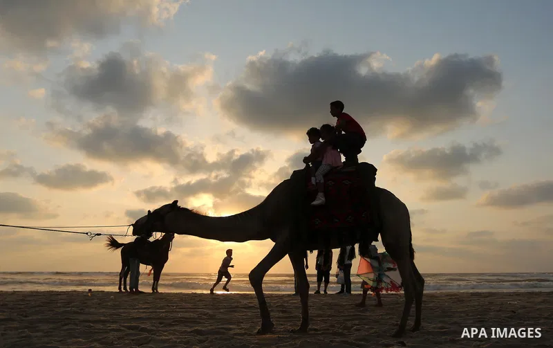 Palestinians enjoy their time of the beach of Gaza city, on July 5, 2017. An immediate consequence of the electricity cuts has been suffering for Gazans. A new U.N. report said Gaza gets electricity just four to six hour...