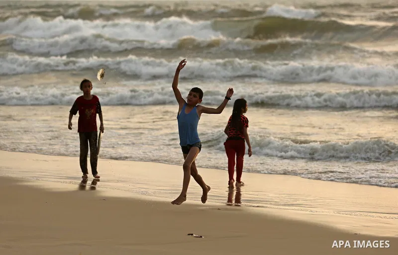 Palestinians enjoy their time of the beach of Gaza city, on July 5, 2017. An immediate consequence of the electricity cuts has been suffering for Gazans. A new U.N. report said Gaza gets electricity just four to six hour...