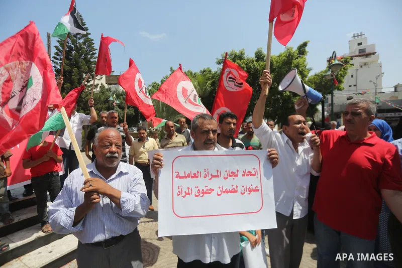 Palestinians take part in a protest against Israeli blockade in Gaza city on July 6, 2017. Photo by Mohammed Asad