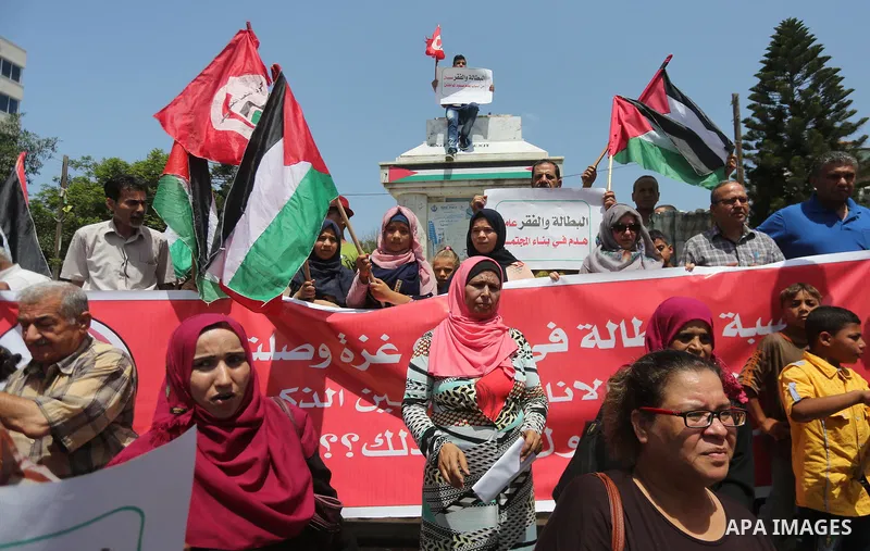 Palestinians take part in a protest against Israeli blockade in Gaza city on July 6, 2017. Photo by Mohammed Asad