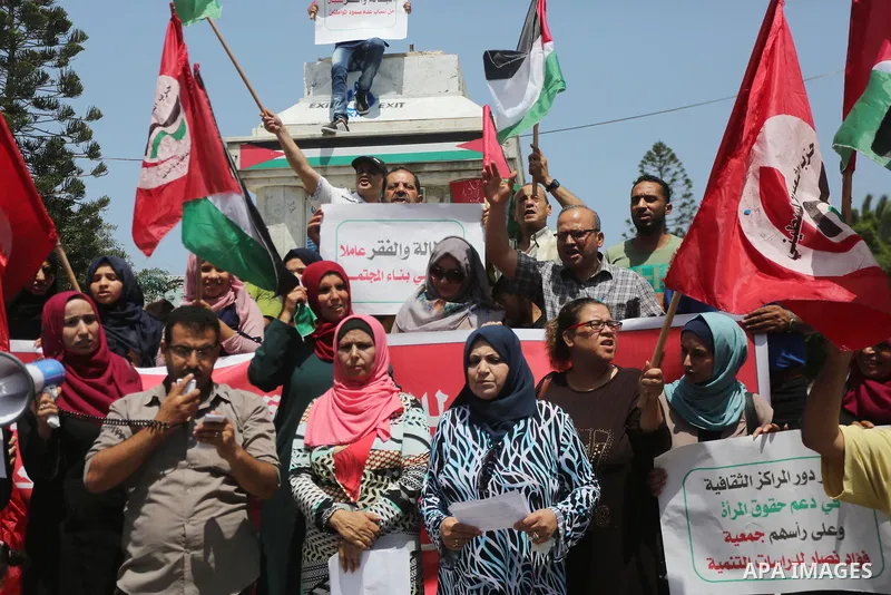 Palestinians take part in a protest against Israeli blockade in Gaza city on July 6, 2017. Photo by Mohammed Asad