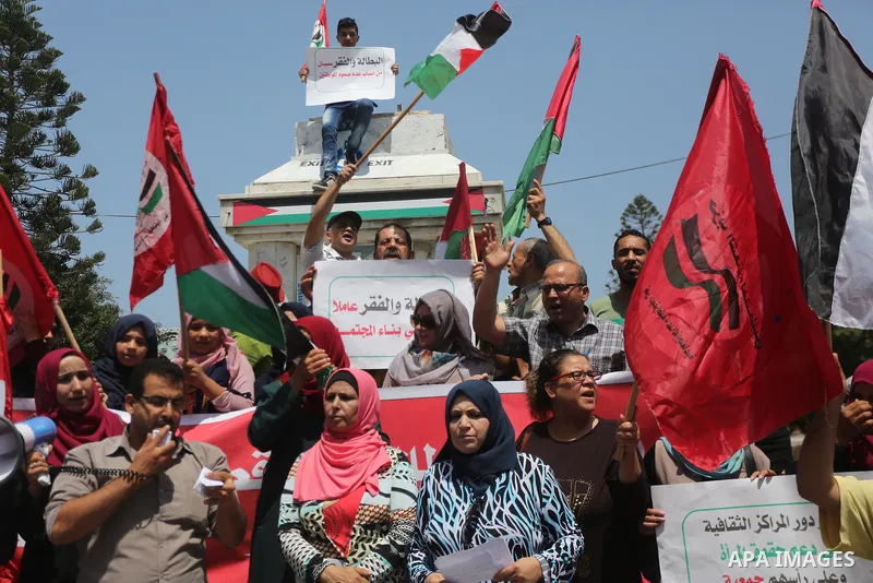 Palestinians take part in a protest against Israeli blockade in Gaza city on July 6, 2017. Photo by Mohammed Asad