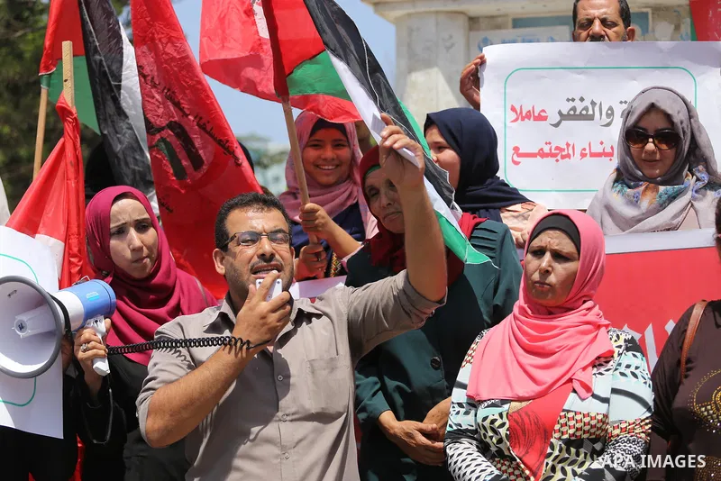 Palestinians take part in a protest against Israeli blockade in Gaza city on July 6, 2017. Photo by Mohammed Asad