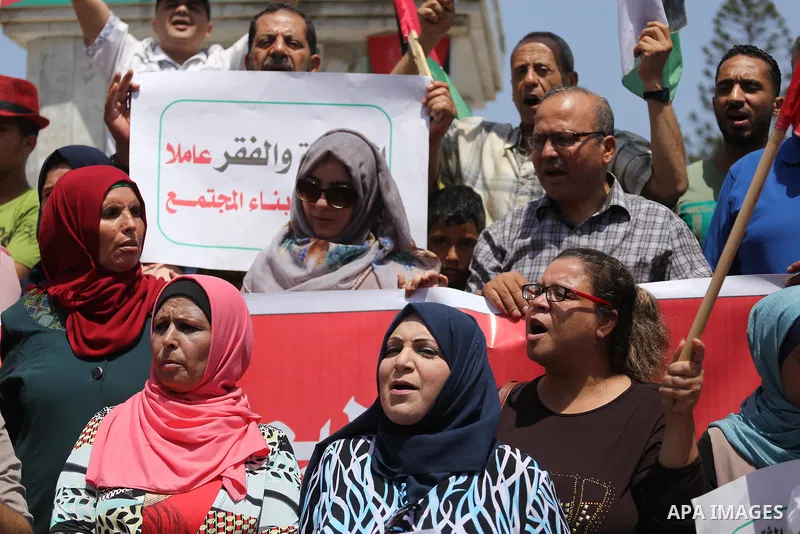 Palestinians take part in a protest against Israeli blockade in Gaza city on July 6, 2017. Photo by Mohammed Asad