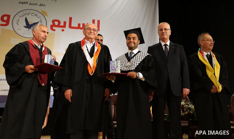 Palestinian Prime Minister Rami Hamdallah attends the graduation ceremony of the 37 at Al-Najah University in West bank city of Nablus on July 6,2017. Photo by Prime Minister Office