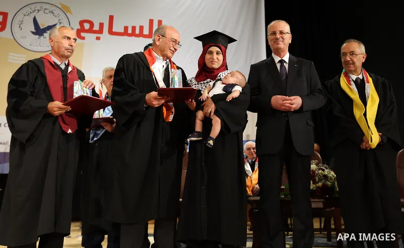 Palestinian Prime Minister Rami Hamdallah attends the graduation ceremony of the 37 at Al-Najah University in West bank city of Nablus on July 6,2017. Photo by Prime Minister Office