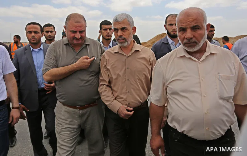 Yahya Sinwar the new leader of the Hamas Islamist movement in the Gaza Strip inspects a section of the border with Egypt, in the southern Gaza strip town of Rafah, on July 6, 2017. The buffer zone is expected to extend f...