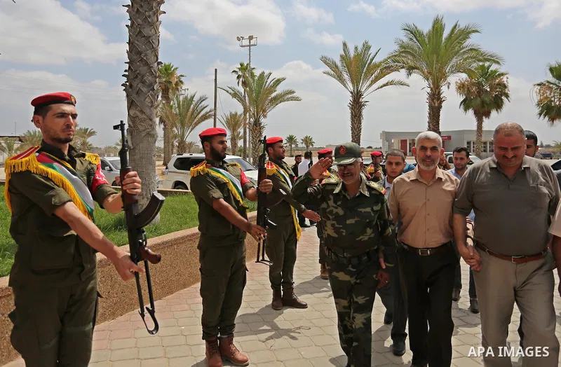 Yahya Sinwar the new leader of the Hamas Islamist movement in the Gaza Strip inspects a section of the border with Egypt, in the southern Gaza strip town of Rafah, on July 6, 2017. The buffer zone is expected to extend f...