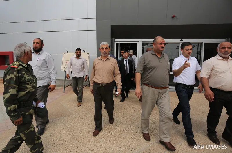Yahya Sinwar the new leader of the Hamas Islamist movement in the Gaza Strip inspects a section of the border with Egypt, in the southern Gaza strip town of Rafah, on July 6, 2017. The buffer zone is expected to extend f...
