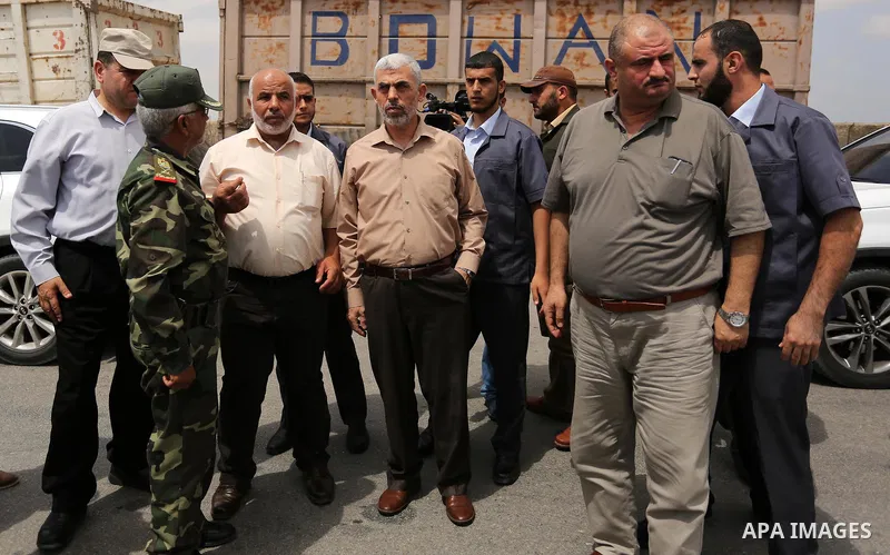 Yahya Sinwar the new leader of the Hamas Islamist movement in the Gaza Strip inspects a section of the border with Egypt, in the southern Gaza strip town of Rafah, on July 6, 2017. The buffer zone is expected to extend f...