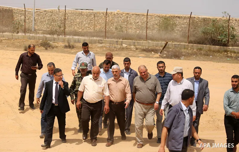 Yahya Sinwar the new leader of the Hamas Islamist movement in the Gaza Strip inspects a section of the border with Egypt, in the southern Gaza strip town of Rafah, on July 6, 2017. The buffer zone is expected to extend f...