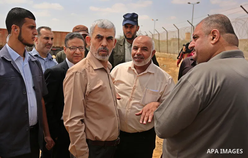Yahya Sinwar the new leader of the Hamas Islamist movement in the Gaza Strip inspects a section of the border with Egypt, in the southern Gaza strip town of Rafah, on July 6, 2017. The buffer zone is expected to extend f...