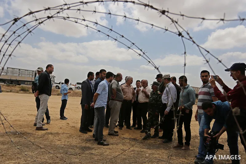 Yahya Sinwar the new leader of the Hamas Islamist movement in the Gaza Strip inspects a section of the border with Egypt, in the southern Gaza strip town of Rafah, on July 6, 2017. The buffer zone is expected to extend f...