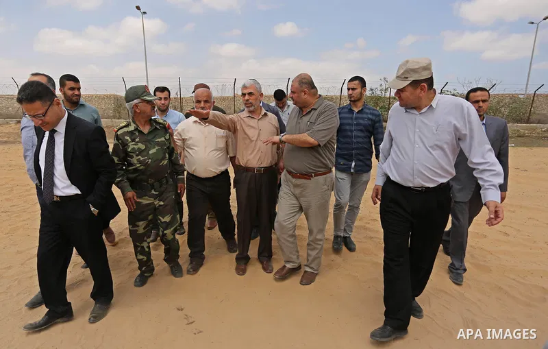 Yahya Sinwar the new leader of the Hamas Islamist movement in the Gaza Strip inspects a section of the border with Egypt, in the southern Gaza strip town of Rafah, on July 6, 2017. The buffer zone is expected to extend f...