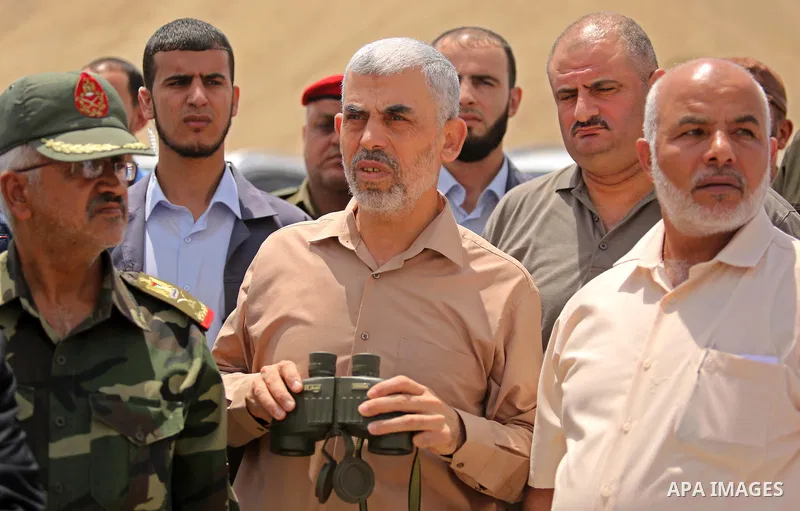Yahya Sinwar the new leader of the Hamas Islamist movement in the Gaza Strip inspects a section of the border with Egypt, in the southern Gaza strip town of Rafah, on July 6, 2017. The buffer zone is expected to extend f...